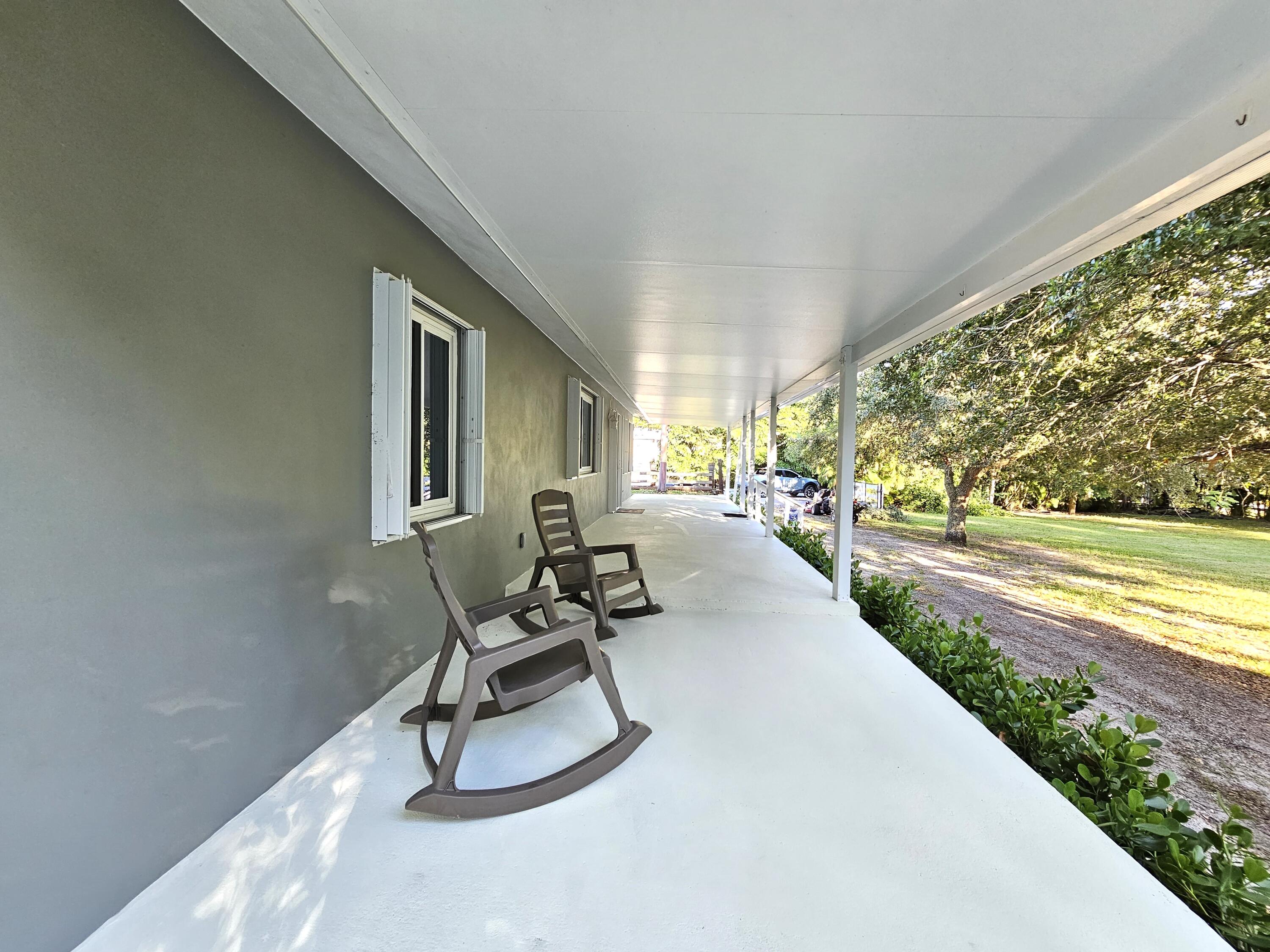 12575 52nd Road North The Acreage, FL 33411 - Photo 5 of 65 Front Patio