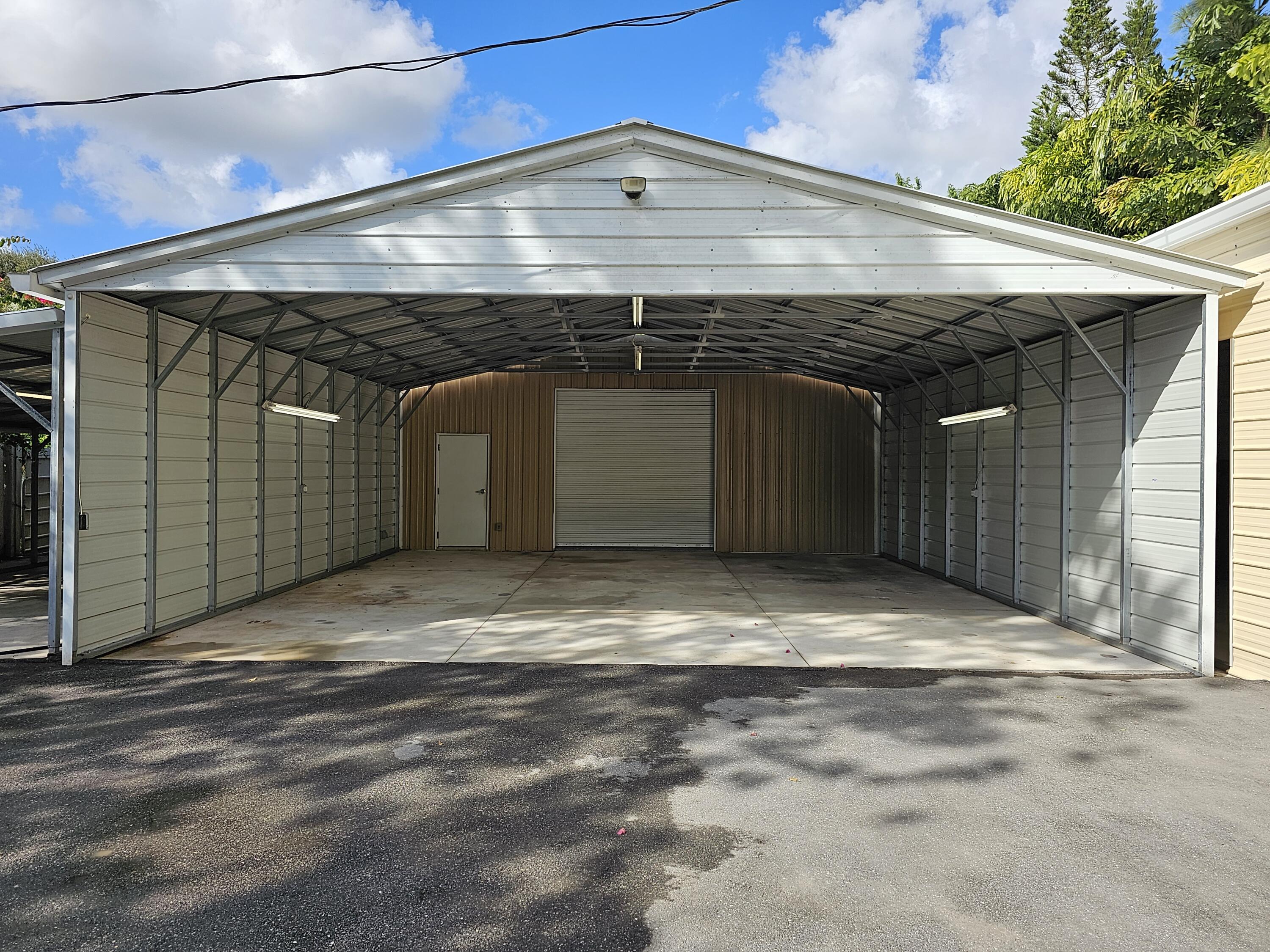 12575 52nd Road North The Acreage, FL 33411 - Photo 60 of 65 Front awning of ac'd shop