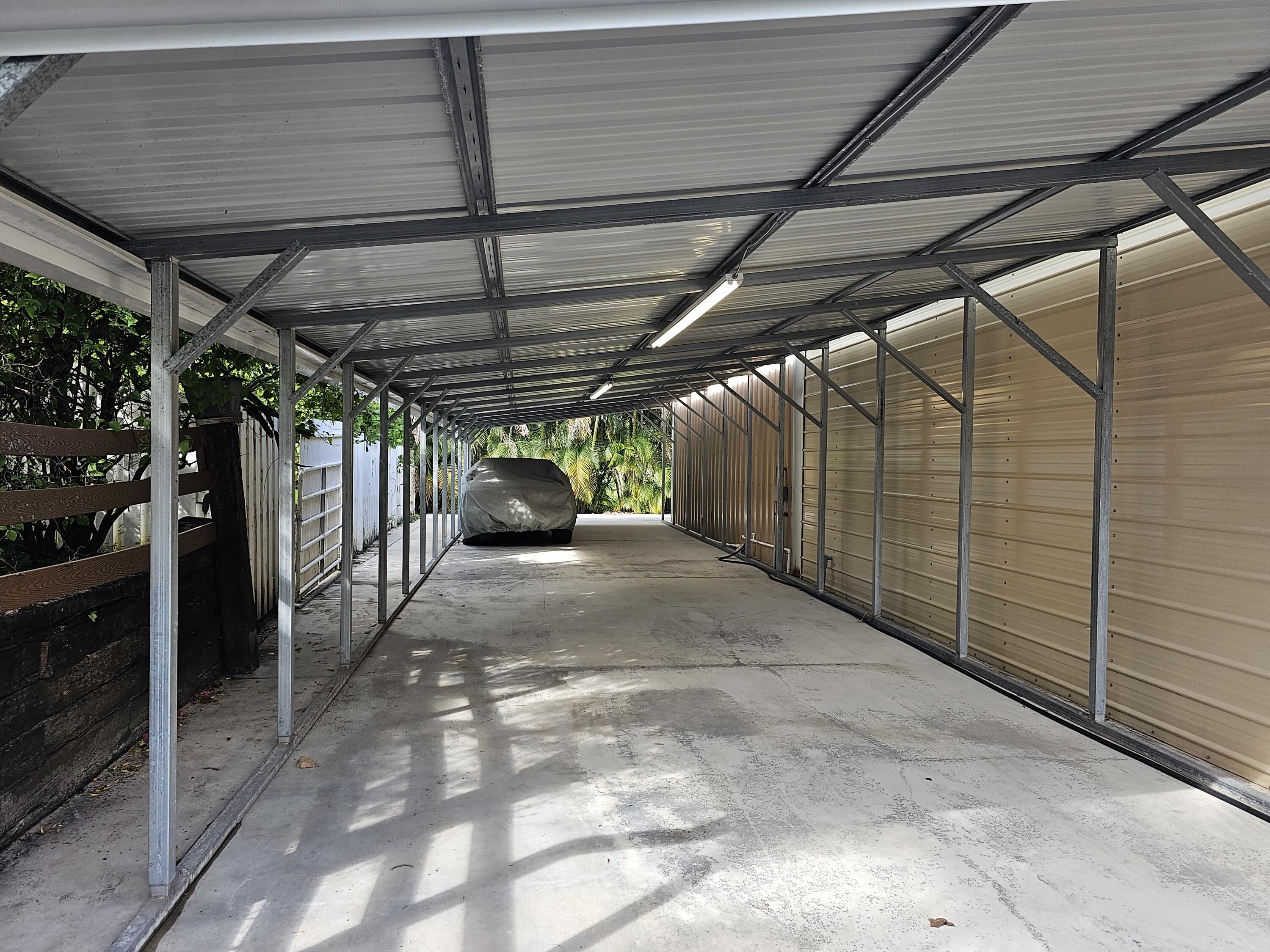 12575 52nd Road North The Acreage, FL 33411 - Photo 61 of 65 Left side of shop covered space