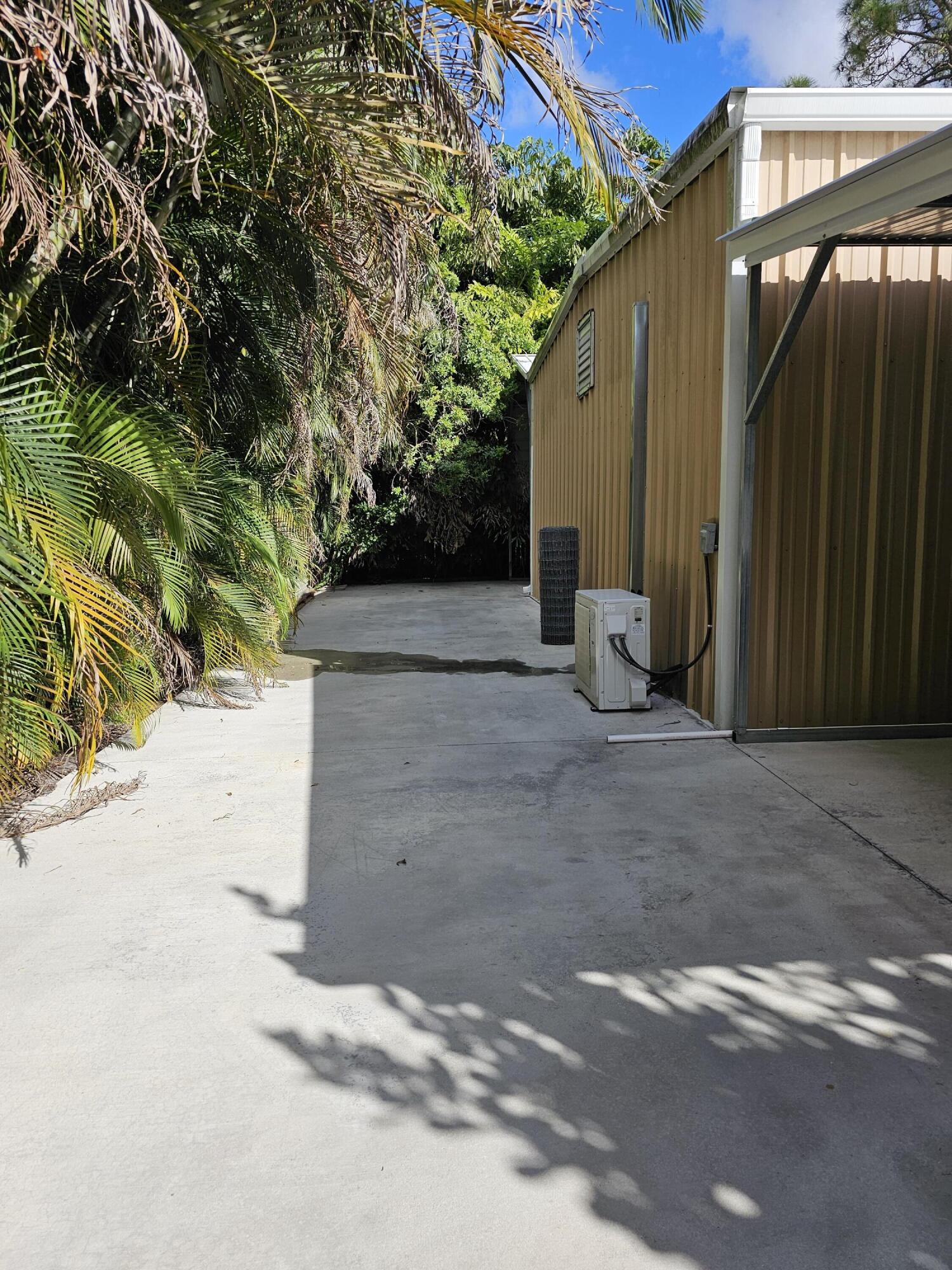 12575 52nd Road North The Acreage, FL 33411 - Photo 62 of 65 Behind detached building