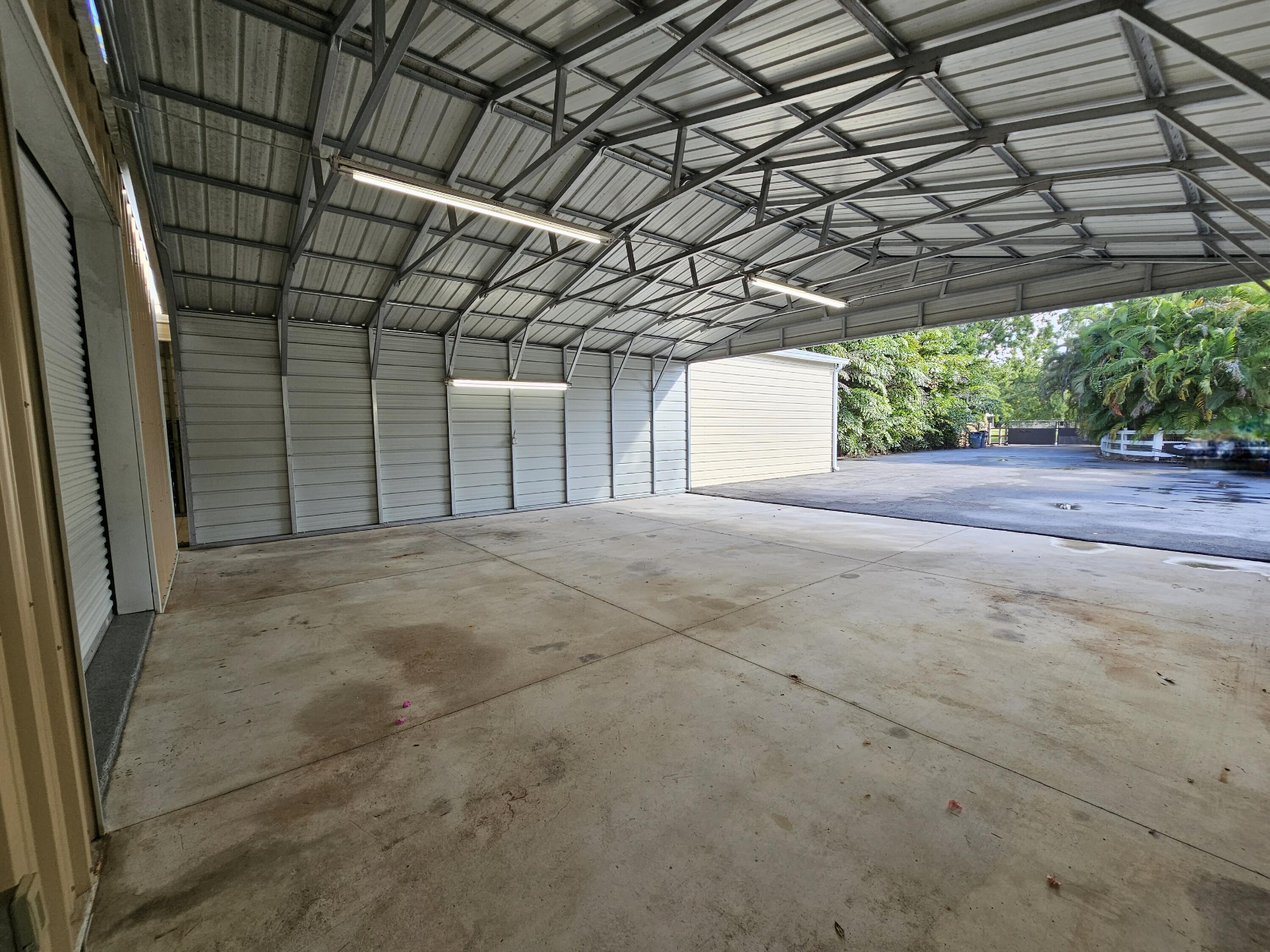 12575 52nd Road North The Acreage, FL 33411 - Photo 65 of 65 Covered space in front of shop building