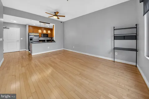 a view of an empty room with a flat screen tv
