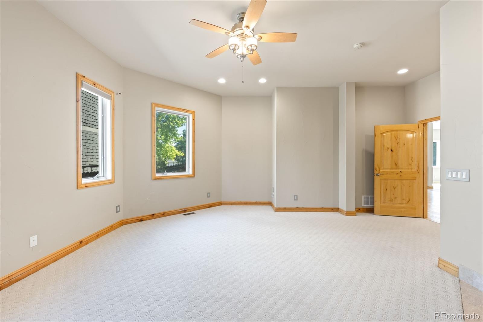 2895 South Cook Street Denver, CO 80210 - Photo 17 of 41 a view of an empty room with a window