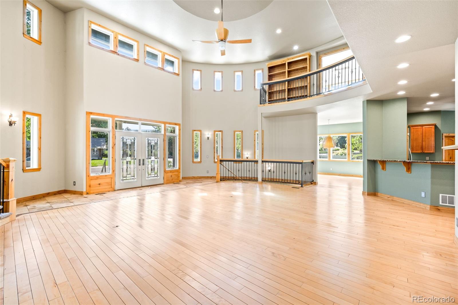 2895 South Cook Street Denver, CO 80210 - Photo 7 of 41 a view of an entryway with wooden floor
