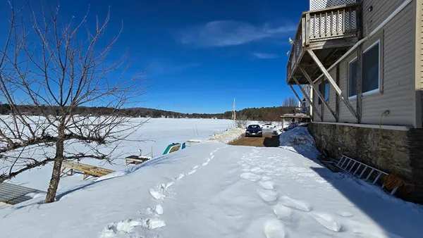a view of a house with a snow