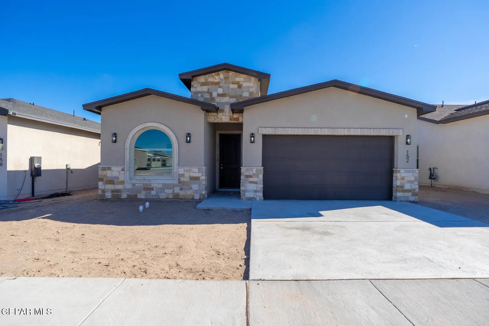 152 Ruth Trail Sunland Park, NM 88008 - Photo 1 of 1 a view of a livingroom with furniture and cabinet