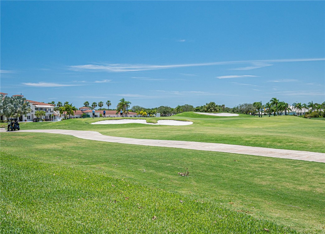 a view of a golf course with a building