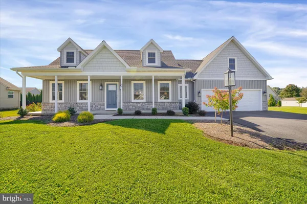 a front view of a house with swimming pool