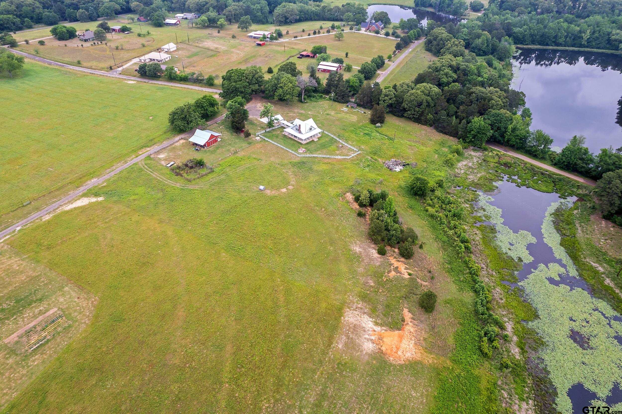 3022 County Road 3802 Bullard, TX 75757 - Photo 36 of 46 an aerial view of residential houses with outdoor space and swimming pool