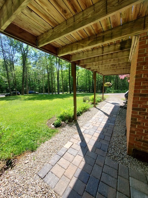 583 Williamsburg Road Conway, MA 01096 - Photo 7 of 38 a view of a backyard with wooden floor