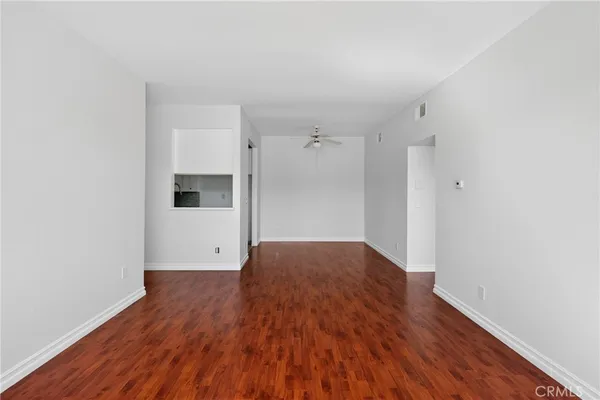 a view of a livingroom with wooden floor
