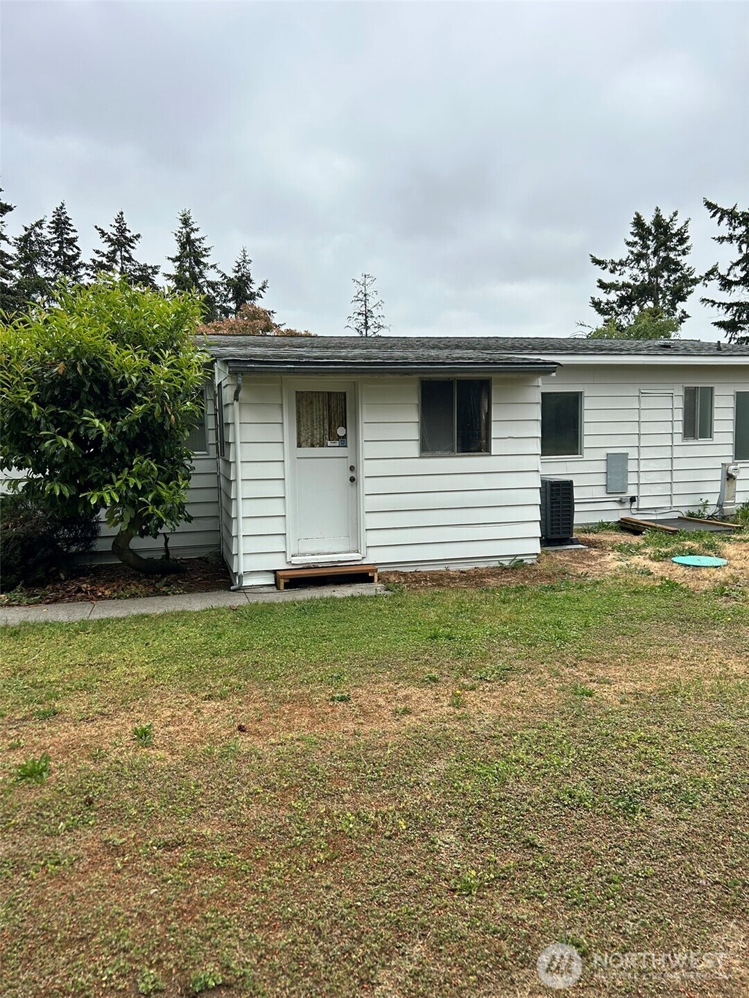 791 Elliot Court Sequim, WA 98382 - Photo 25 of 37 a house view with a garden space