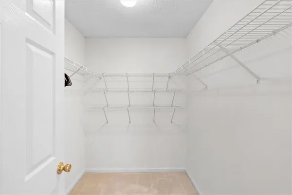 a view of a room with racks on the wall