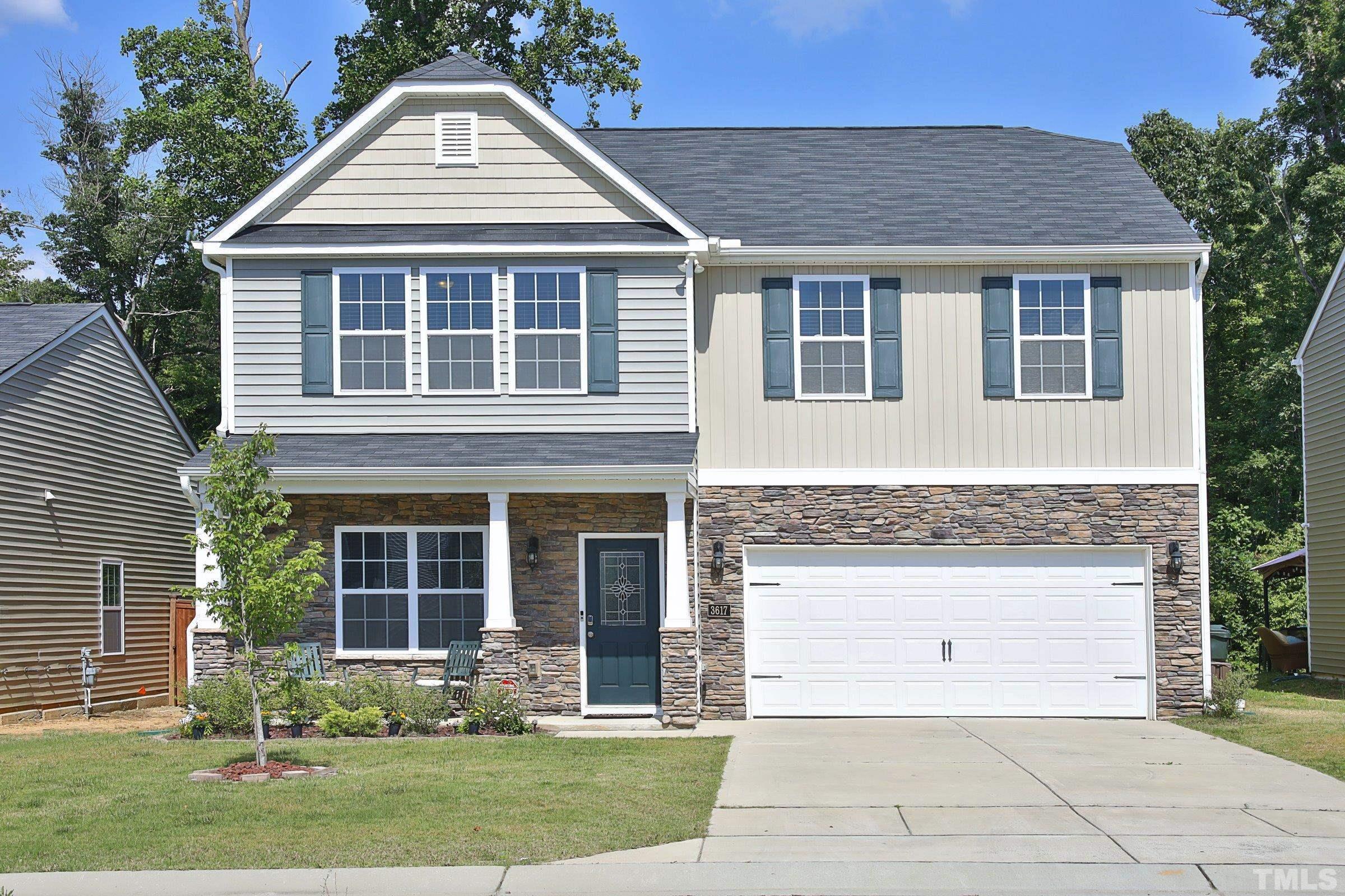 3617 Waleback Lane Raleigh, NC 27610 - Photo 1 of 34 a front view of a house with a yard