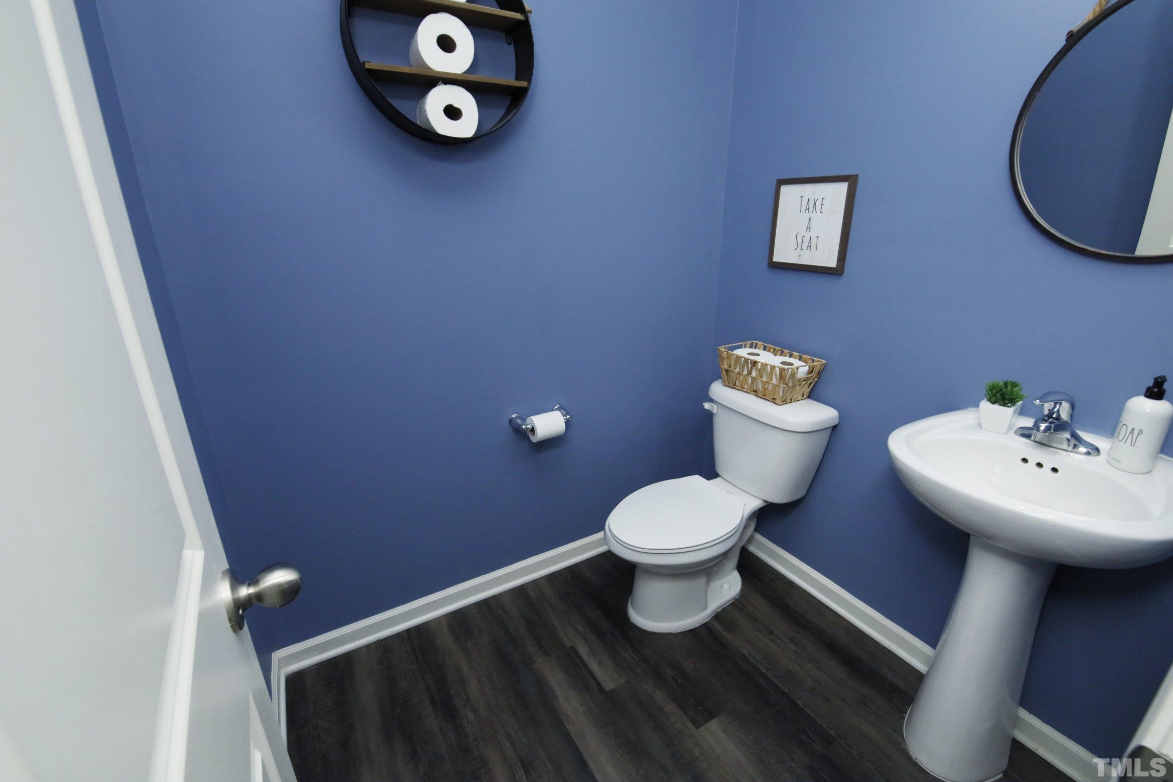 3617 Waleback Lane Raleigh, NC 27610 - Photo 17 of 34 a bathroom with a toilet