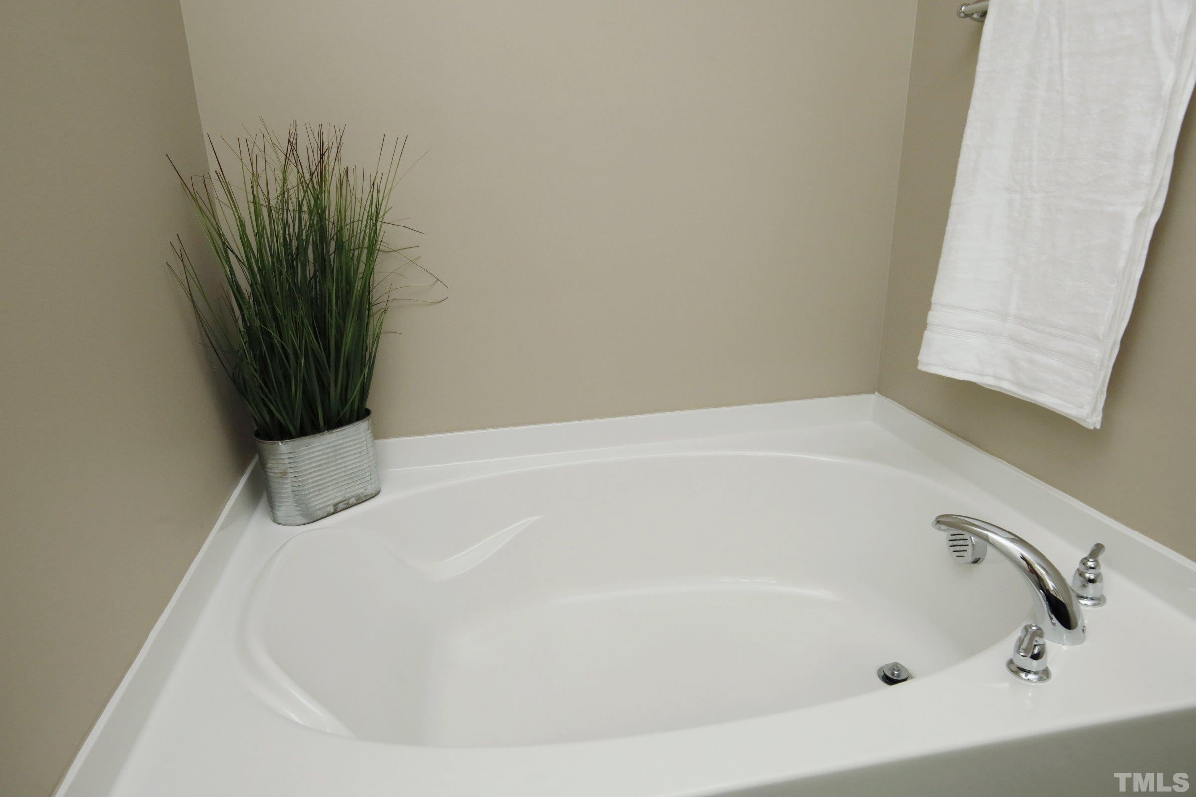 3617 Waleback Lane Raleigh, NC 27610 - Photo 23 of 34 a bathroom with a bathtub