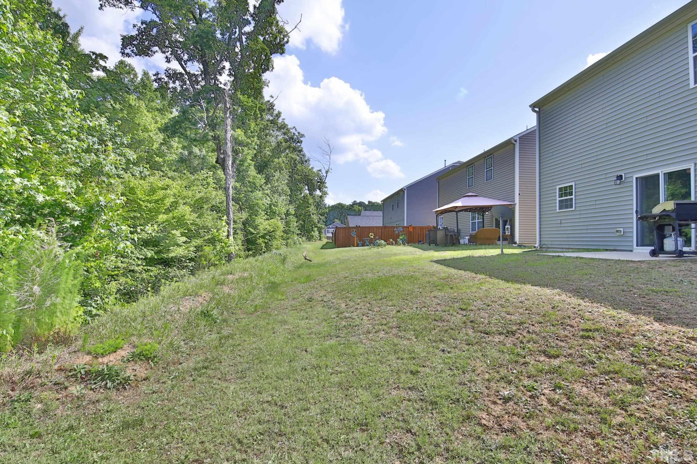 3617 Waleback Lane Raleigh, NC 27610 - Photo 33 of 34 a view of a house with a yard