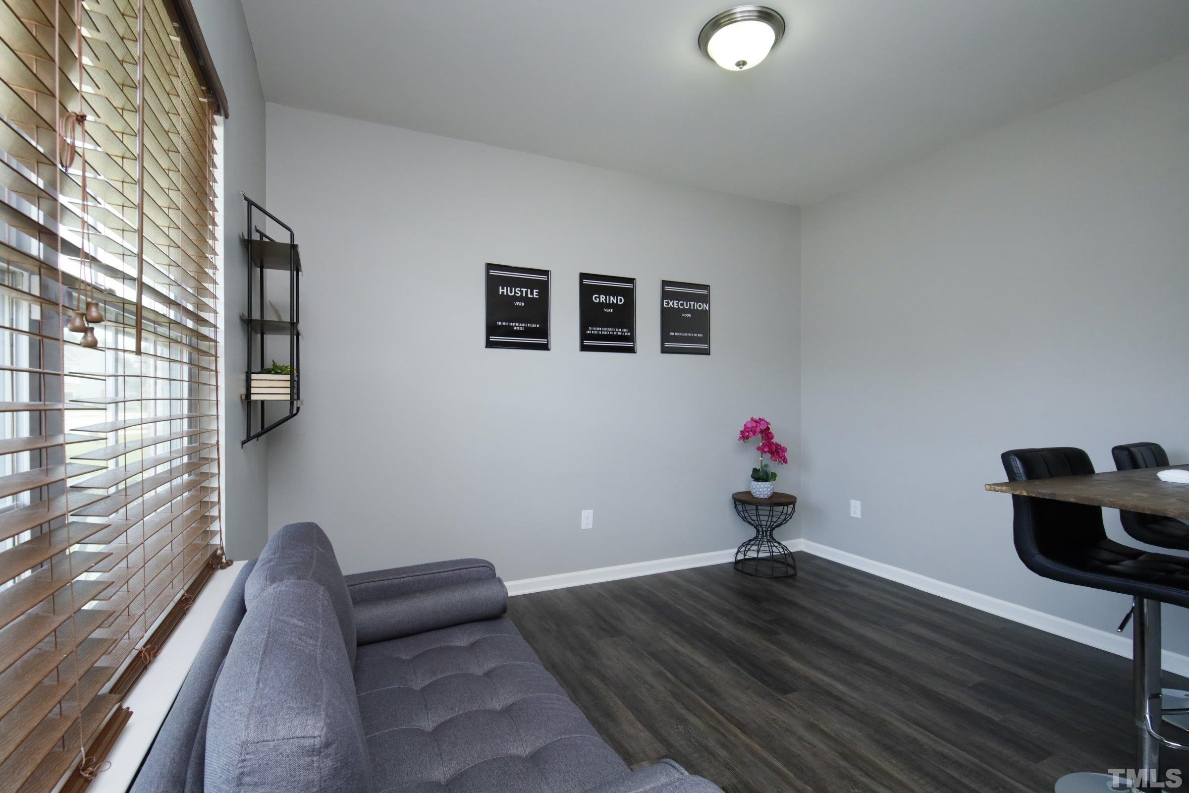 3617 Waleback Lane Raleigh, NC 27610 - Photo 6 of 34 a room with furniture and a window