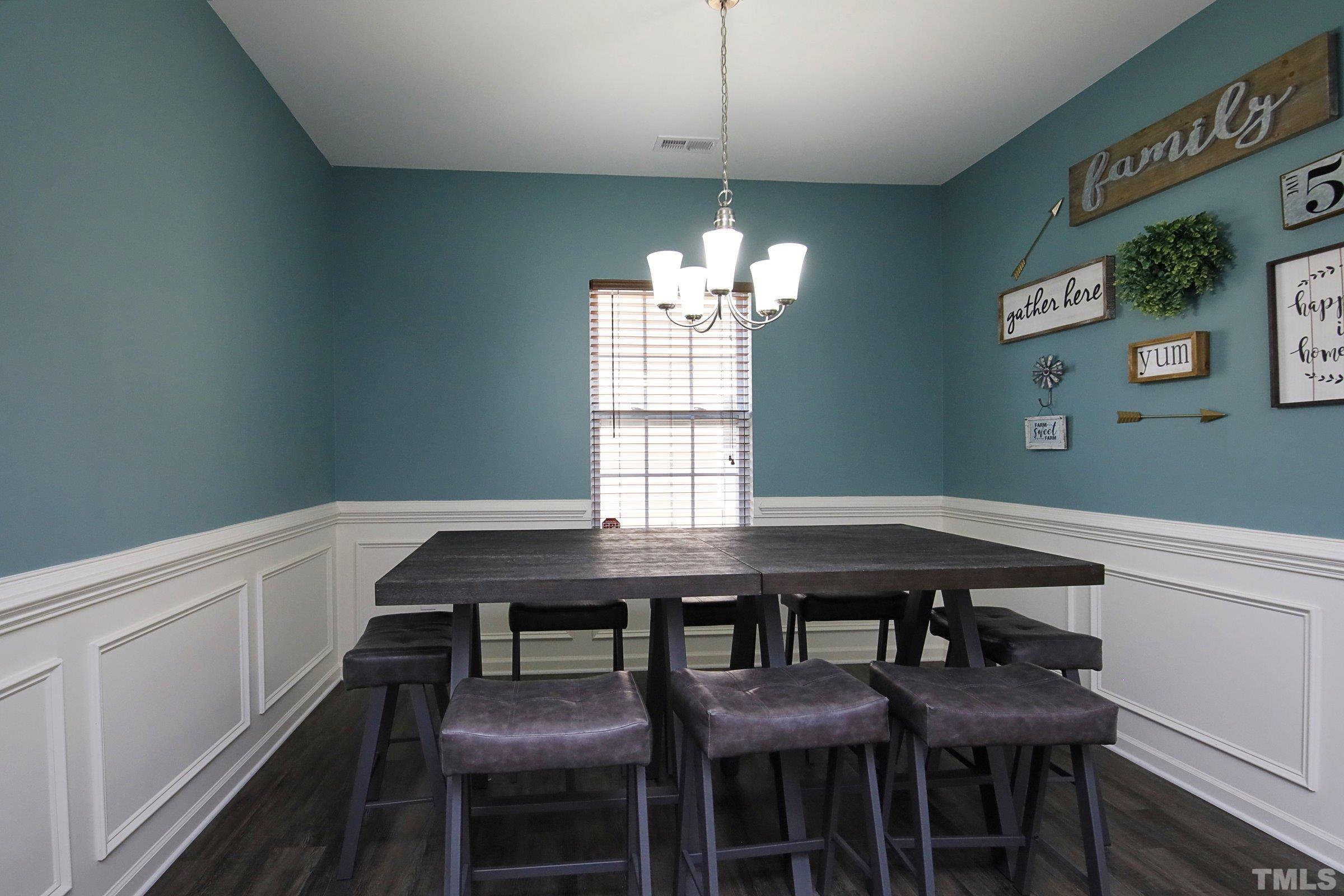 3617 Waleback Lane Raleigh, NC 27610 - Photo 8 of 34 a view of a dining room with furniture and window