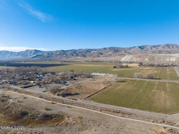 a view of a water with a mountain in the background