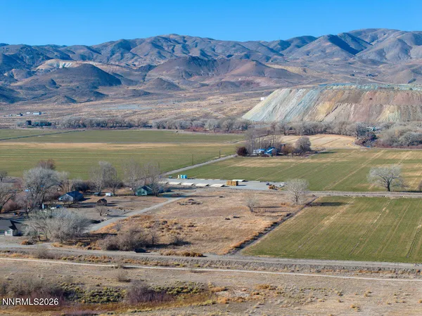 a view of swimming pool with a yard