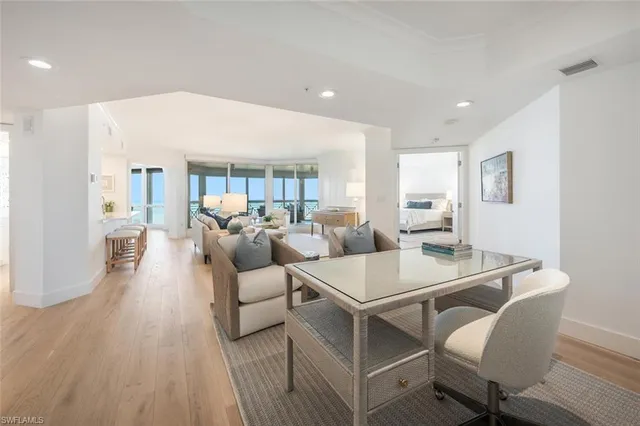 a kitchen with a table and chairs in it