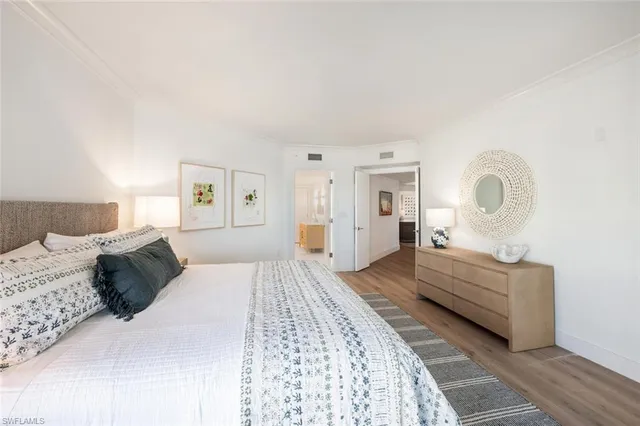 a large bathroom with a double vanity sink mirror and shower