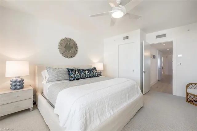 a bathroom with a toilet sink and shower