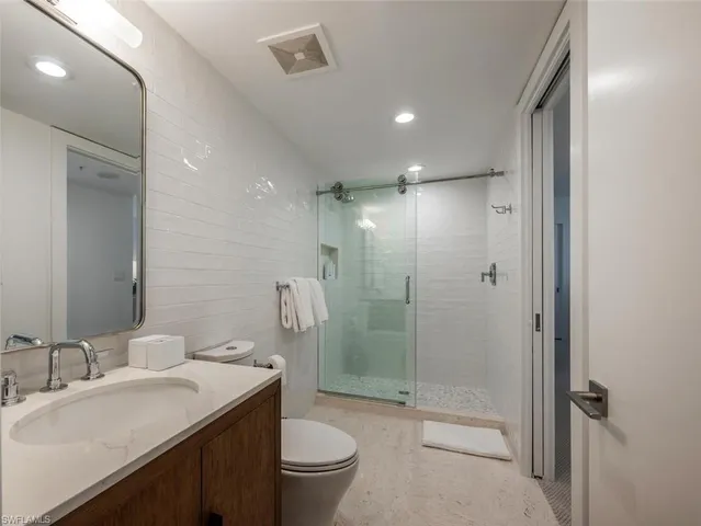 a view of a balcony with furniture