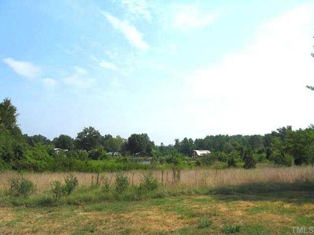 2585 Lucy Garrett Road Timberlake, NC 27583 - Photo 12 of 12 a view of a lake