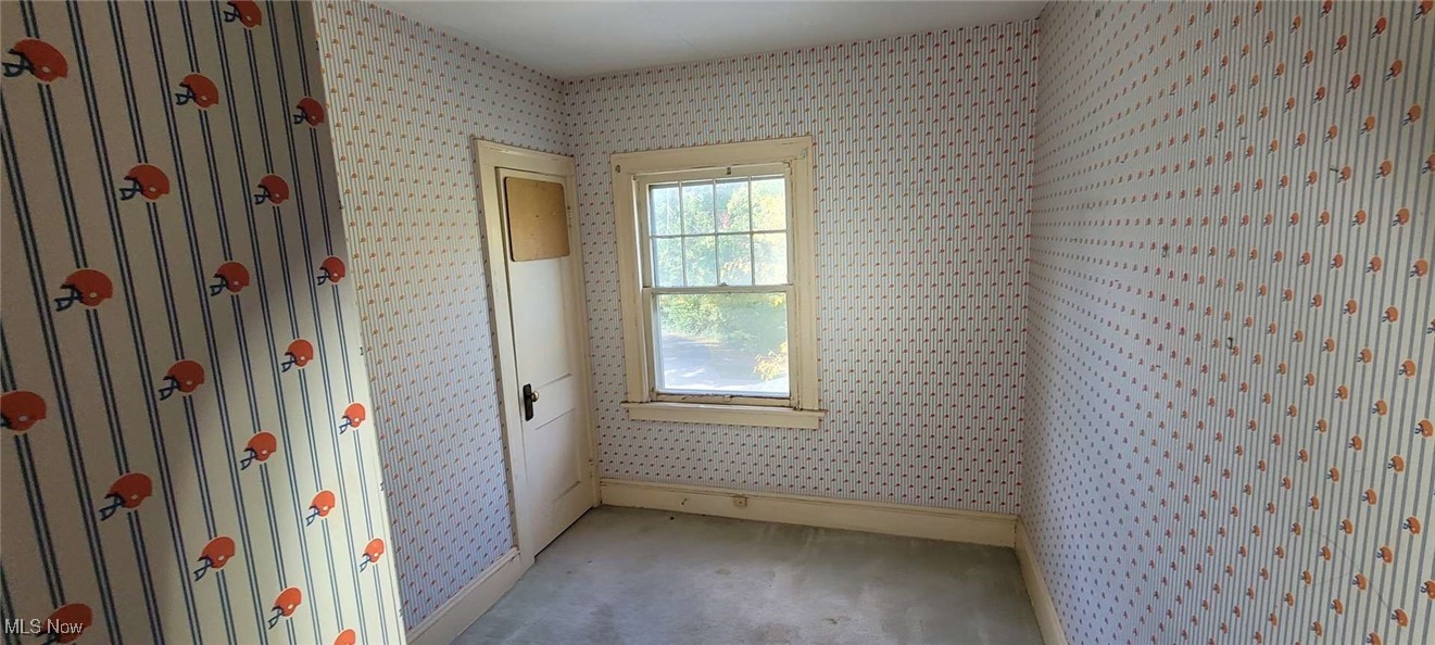 927 Yellowstone Road Cleveland Heights, OH 44121 - Photo 9 of 13 Unfurnished room featuring carpet