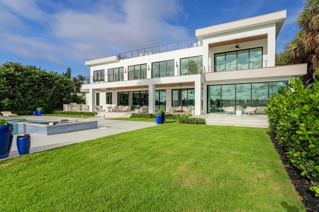 a kitchen with a stove a refrigerator and a sink