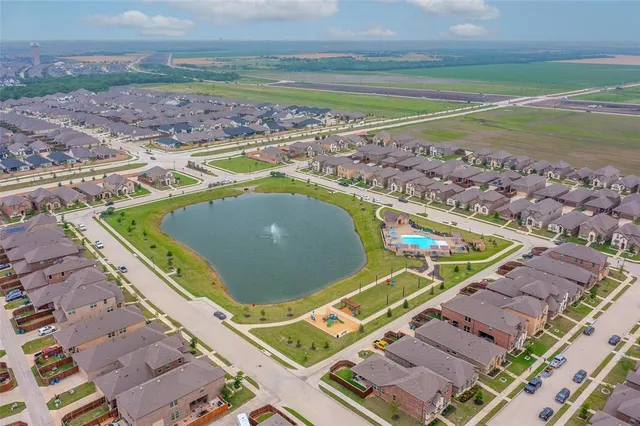 a view of a pool with a ocean view