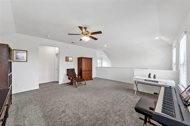 a view of a workspace with furniture