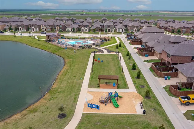 an aerial view of a house with a ocean view