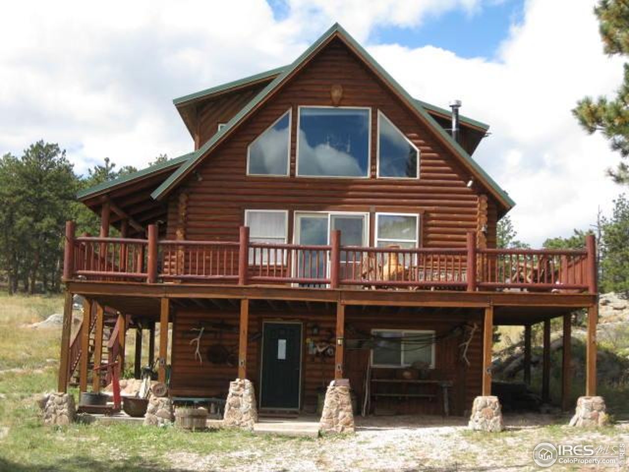a view of a house with large windows