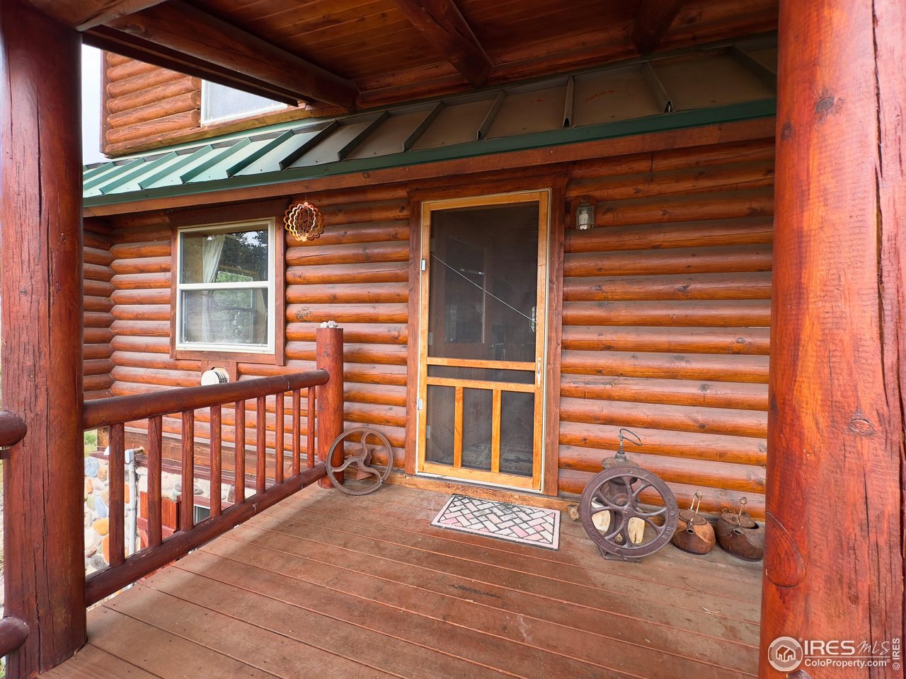 3676 Cherokee Meadows Road Livermore, CO 80536 - Photo 3 of 43 a view of a door and a window