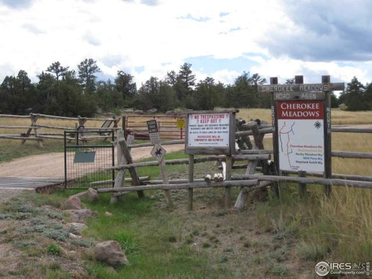 3676 Cherokee Meadows Road Livermore, CO 80536 - Photo 39 of 43 a view of a park with swings
