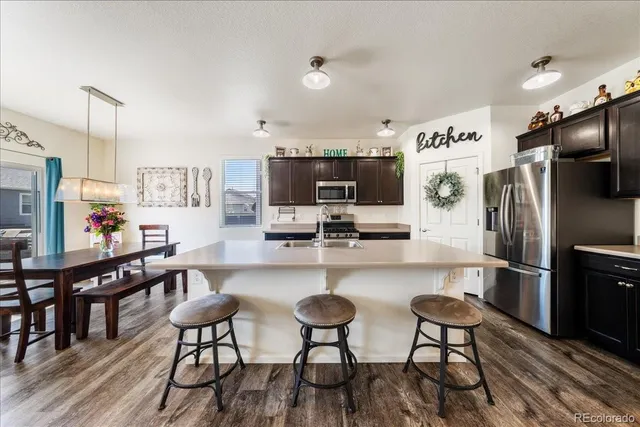 a spacious bedroom with a bed and a window