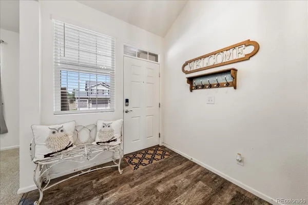 a bedroom with a bed and dresser