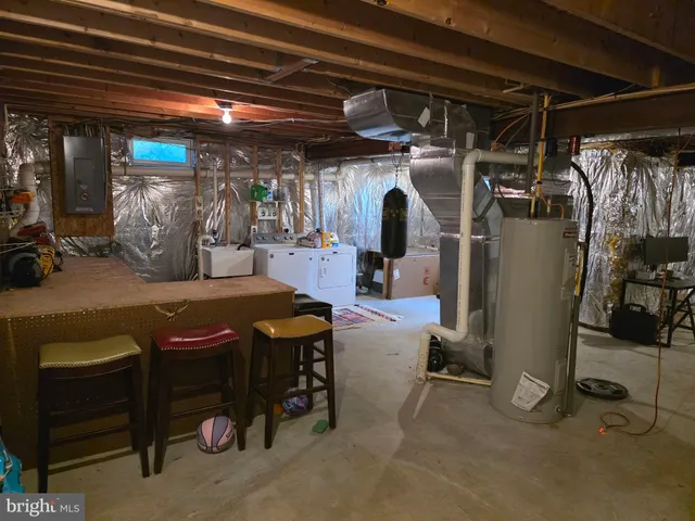 a view of a field of grass and trees