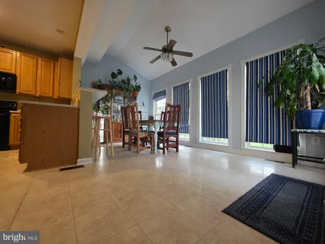 a view of a livingroom with furniture and a garage