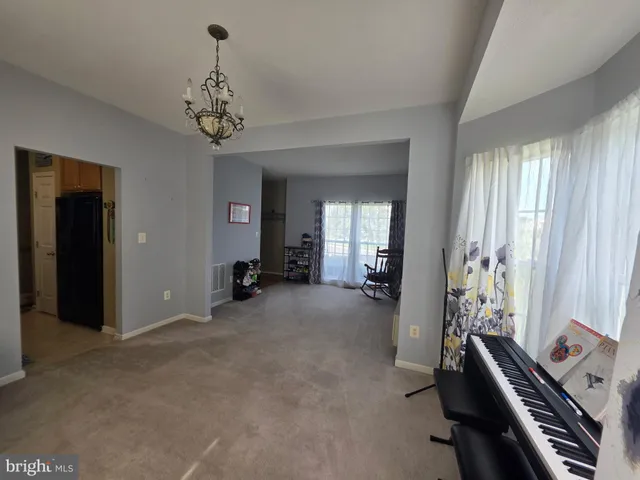 a view of a livingroom with a furniture