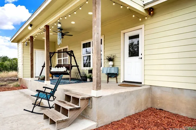 a view of a swimming pool with a sitting space