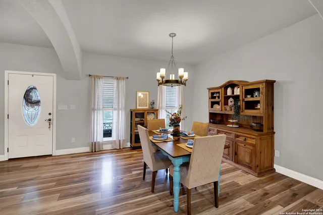 a kitchen with stainless steel appliances kitchen island granite countertop a sink and cabinets