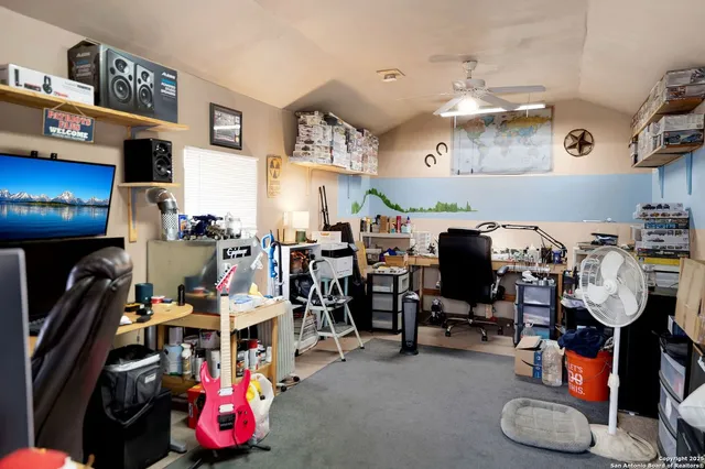 a view of a house with swimming pool and sitting area