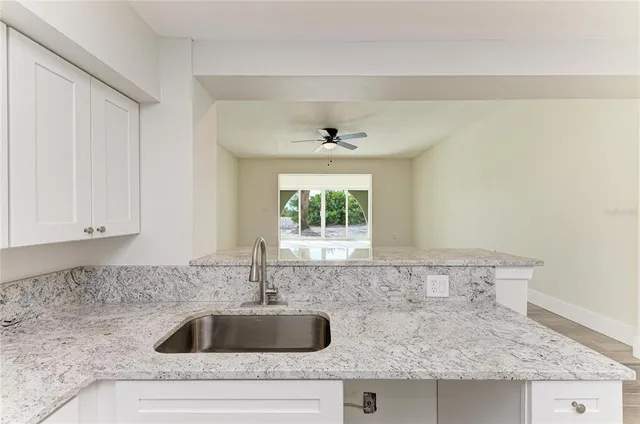 a view of a pathway with a yard