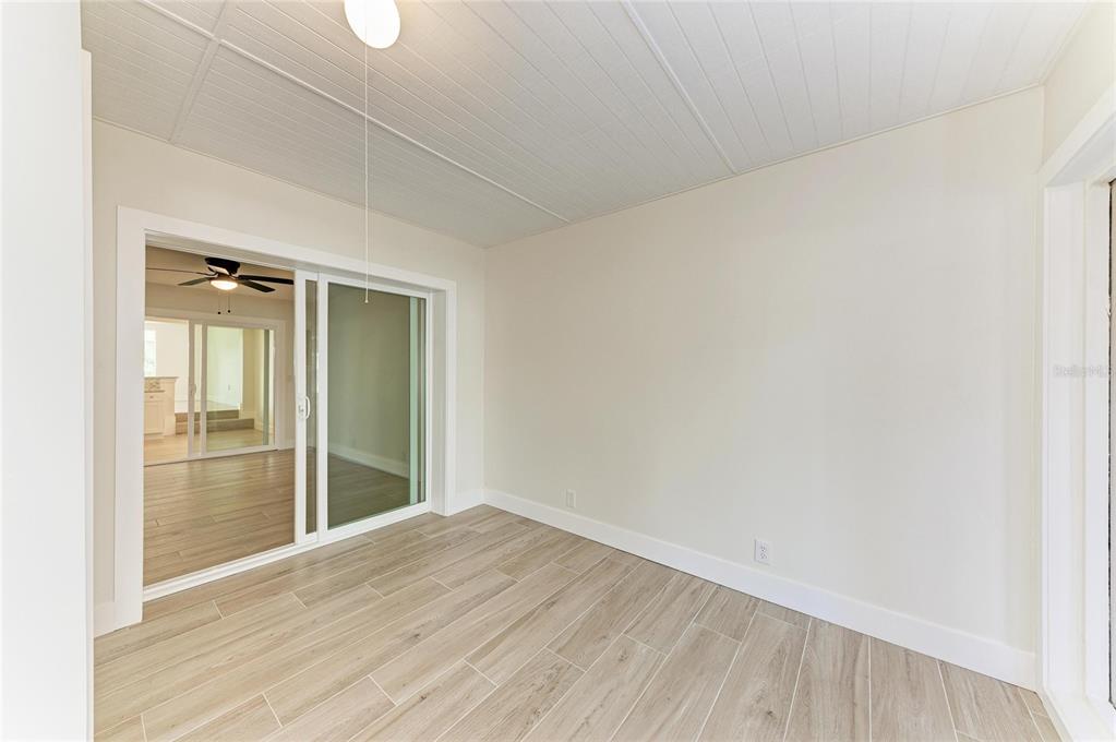 101 73rd Street, Unit 3 Holmes Beach, FL 34217 - Photo 30 of 53 a view of an empty room and window