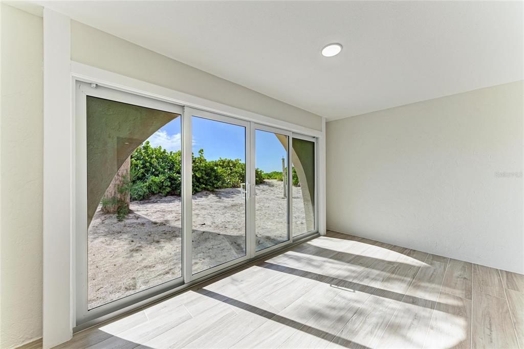 101 73rd Street, Unit 3 Holmes Beach, FL 34217 - Photo 35 of 53 a view of a room with a large window