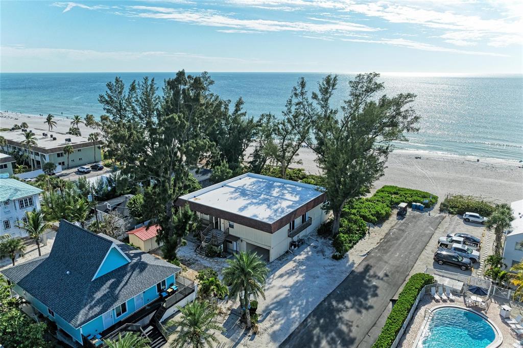 101 73rd Street, Unit 3 Holmes Beach, FL 34217 - Photo 6 of 53 an aerial view of a house with a garden